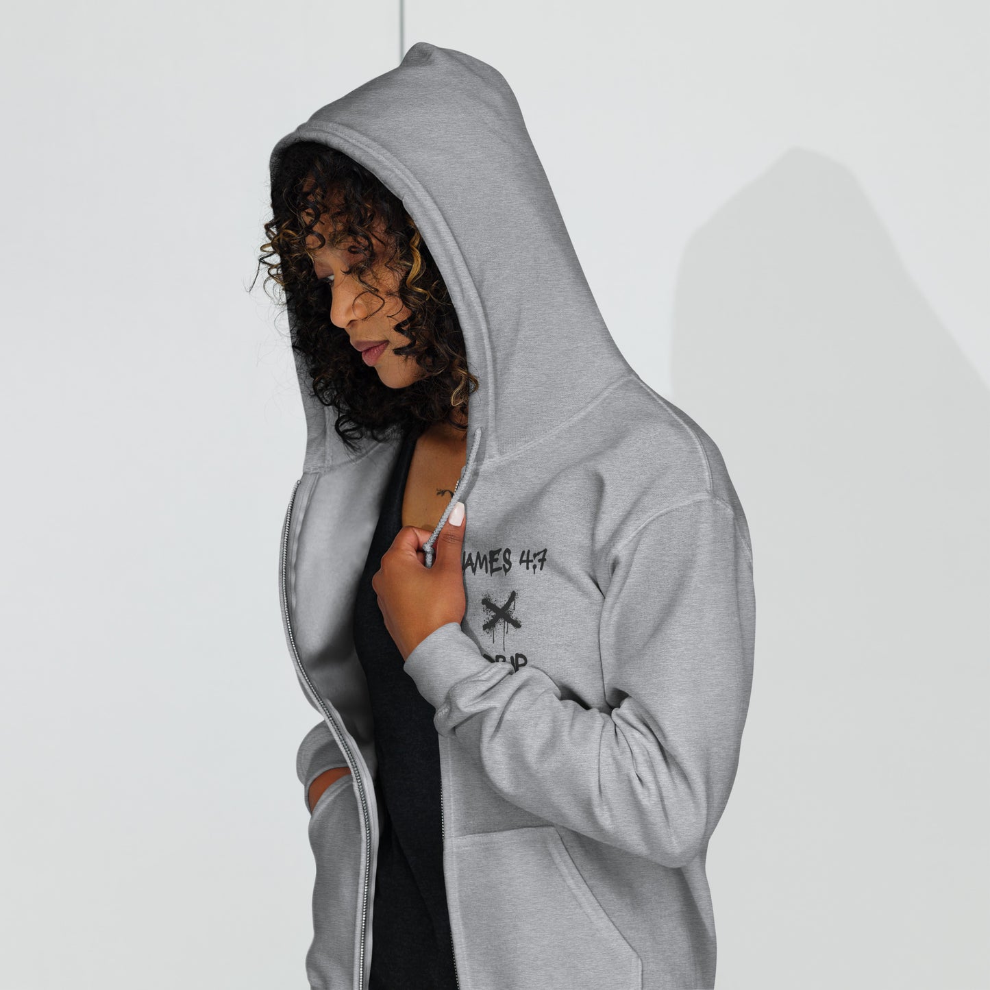 Resist the devil and he will flee Unisex heavy blend zip hoodie